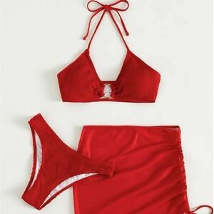 Red three piece bikini. Bikini top, skirt and bikini bottom. Great material,